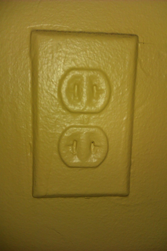 A_power_outlet_painted_over